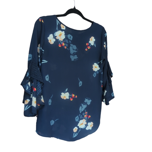 Floral blue with white and red. Size is extra small but easily fits small. - Picture 2 of 6